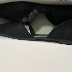 Black faux leather flats